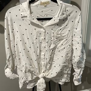 Black and white polka dot button up blouse. Size L